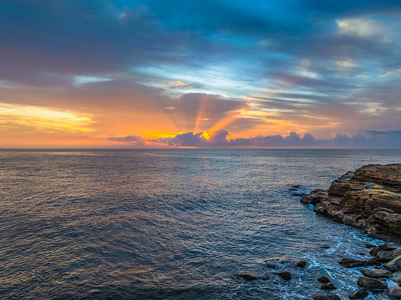 Aerial Sunrise Seascape Shrouded in Fog and High Clouds