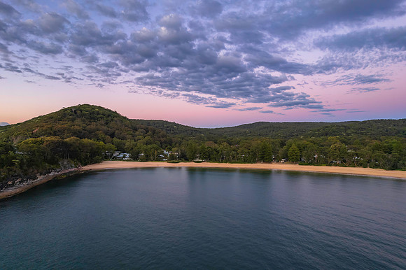 Aerial sunrise seascape with clouds