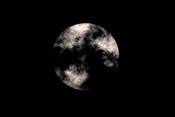 Partial Lunar Eclipse - Blood Moon, Full Moon and dark clouds