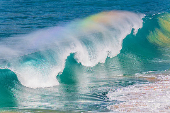 Rainbow light in the Waves at Whale Beach