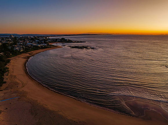 Aerial sunrise seascape with  clear skies