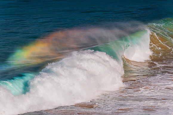 Rainbow light in the Waves at Whale Beach