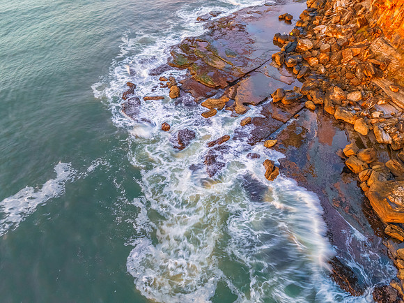 Winter seascape top down views over the rock platform