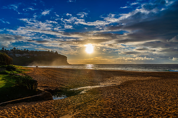 Sunrise at the Seaside with rain clouds
