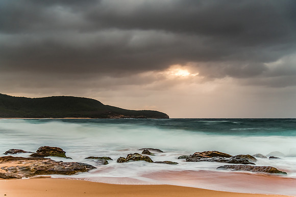 Moody morning sunrise at the seaside