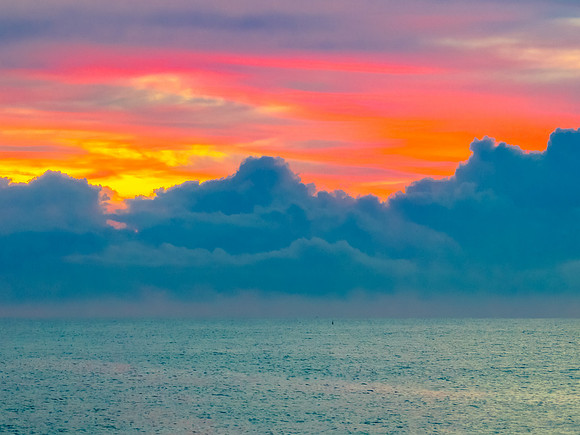 Aerial Sunrise Seascape Shrouded in Fog and High Clouds