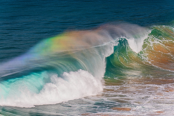 Rainbow light in the Waves at Whale Beach