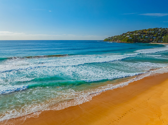 A Perfect Day by the Sea Under Clear Blue Skies