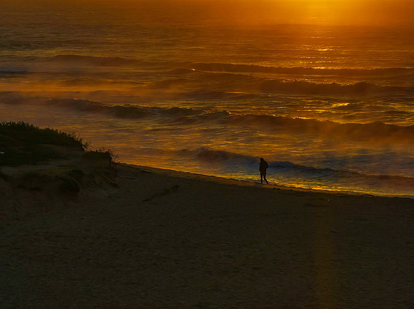 Winter's sunrise with sea mist at the beach