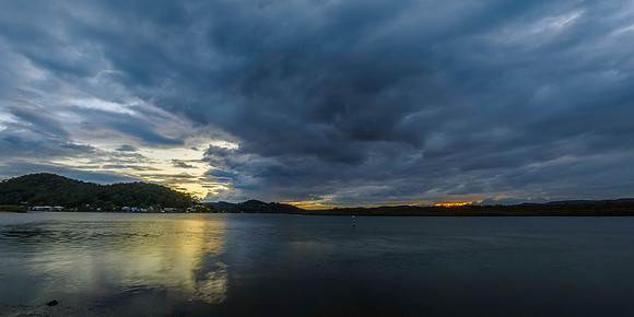 Stormy sunrise skies over the bay