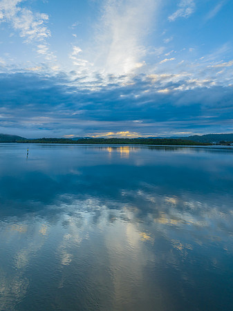 Respite from the rain - Bay waterscape with reflections