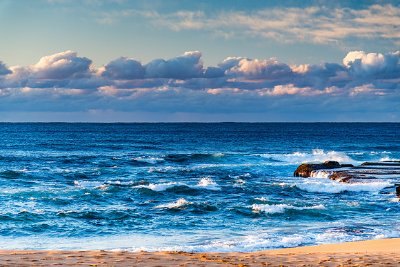 Sunrise by the sea shore