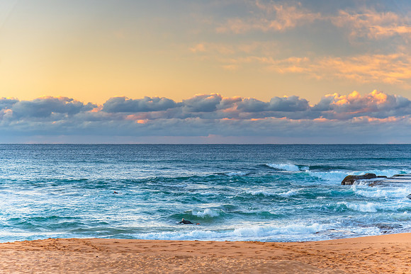 Sunrise by the sea shore