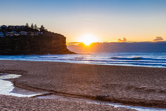 Sunrise by the sea shore
