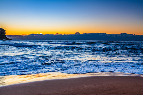 Sunrise by the sea shore