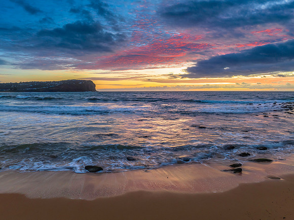 Sunrise seascape with clouds