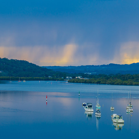 Early morning storm light and reflections at the waterfront