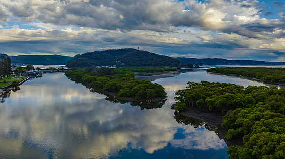 Early morning storm light and reflections at the waterfront
