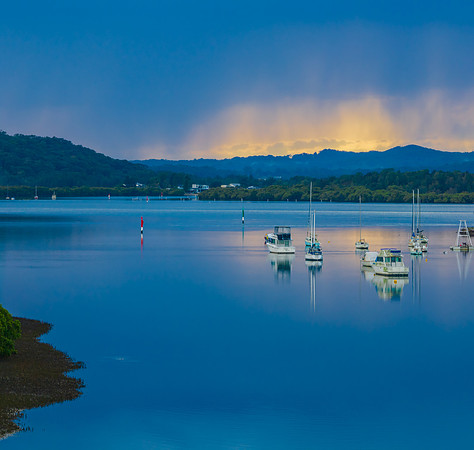 Early morning storm light and reflections at the waterfront