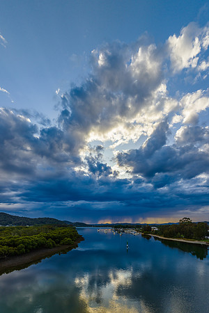 Early morning storm light and reflections at the waterfront