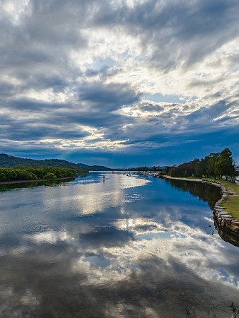 Early morning storm light and reflections at the waterfront