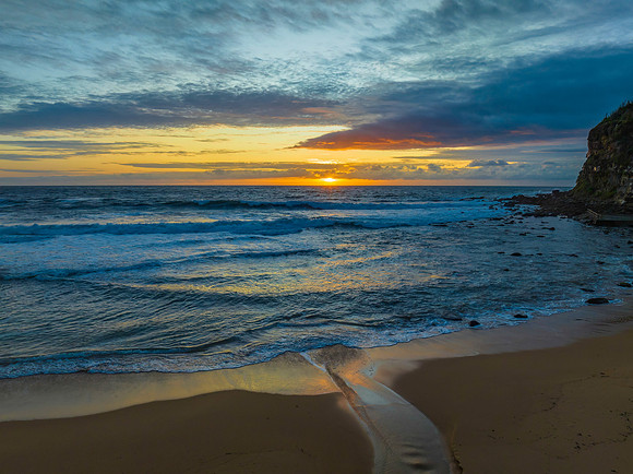 Sunrise seascape with clouds