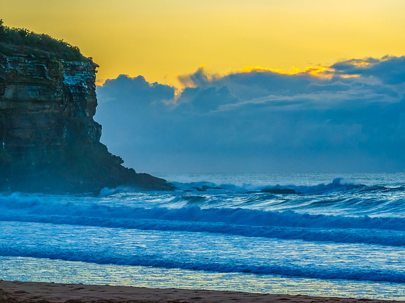 Sunrise views over the sea with low cloud bank