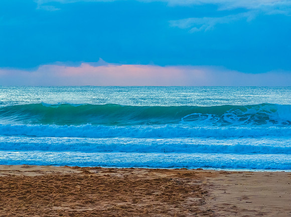 Sunrise views over the sea with low cloud bank