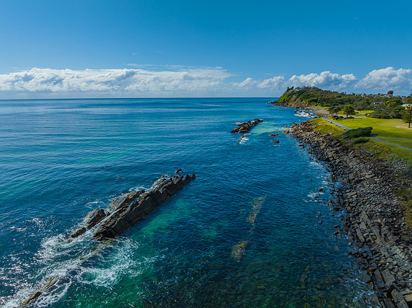 Cumulus clouds and the ocean on a beautiful Spring day