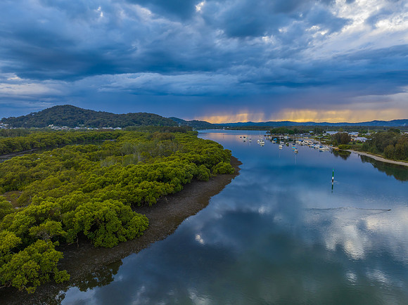 Early morning storm light and reflections at the waterfront