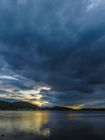 Stormy sunrise skies over the bay