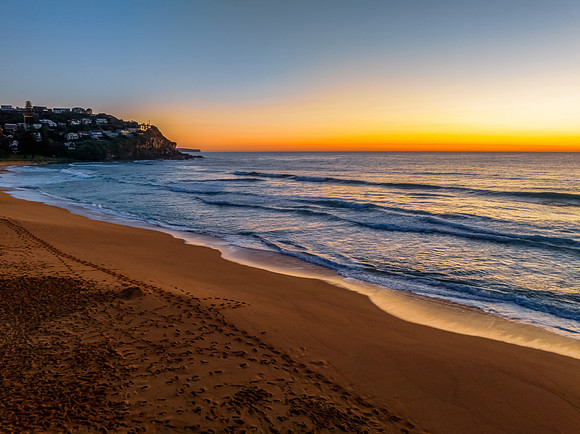 Sunrise at the seaside with a cloudless sky