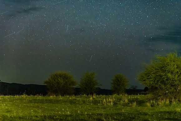 In the dark of the night with satellites in the sky