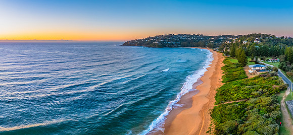 Sunrise at the Seaside with Clear Blue Skies