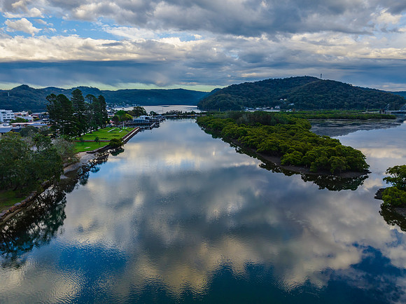 Early morning storm light and reflections at the waterfront