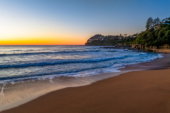 Sunrise at the seaside with a cloudless sky
