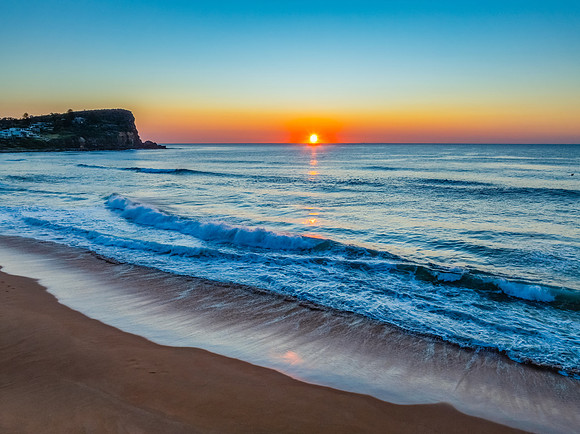 Blush Horizon: Sunrise by the Sea