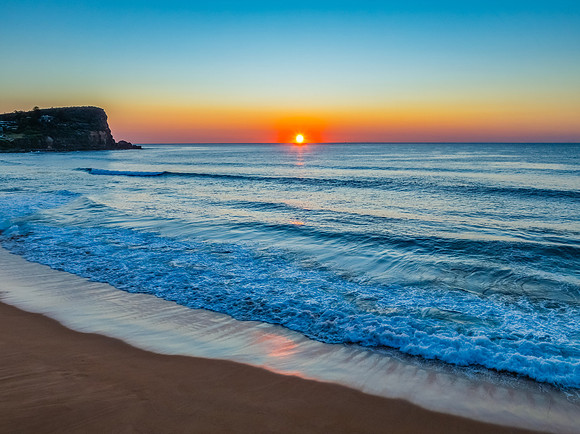 Blush Horizon: Sunrise by the Sea