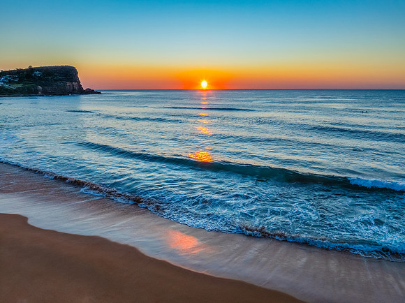 Blush Horizon: Sunrise by the Sea