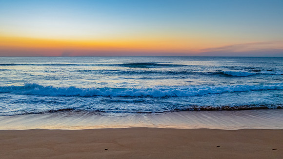 Blush Horizon: Sunrise by the Sea