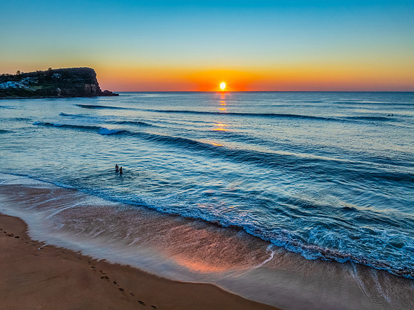 Blush Horizon: Sunrise by the Sea