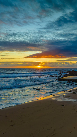 Sunrise seascape with clouds