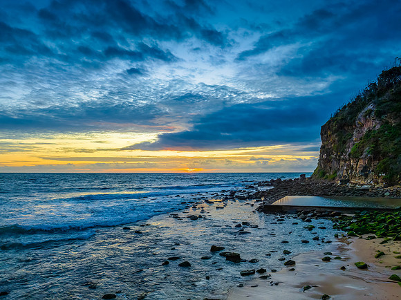 Sunrise seascape with clouds
