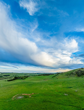 Sunset views over rural farmland with beautiful cloud formations