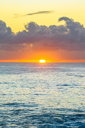 Sunrise Seascape with sun on the horizon