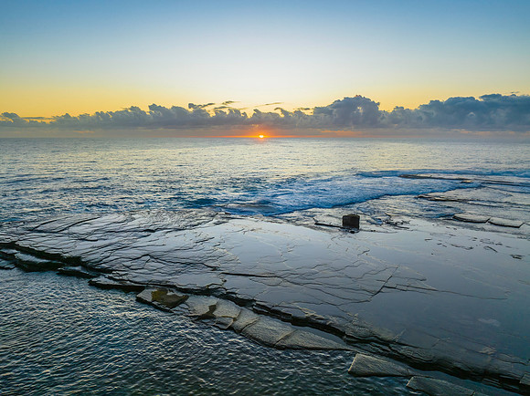 Aerial Sunrise Seascape at Rocky Inlet