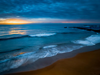 Sunrise at the Seaside with rain clouds