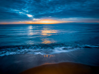 Sunrise at the Seaside with rain clouds
