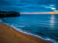 Sunrise at the Seaside with rain clouds