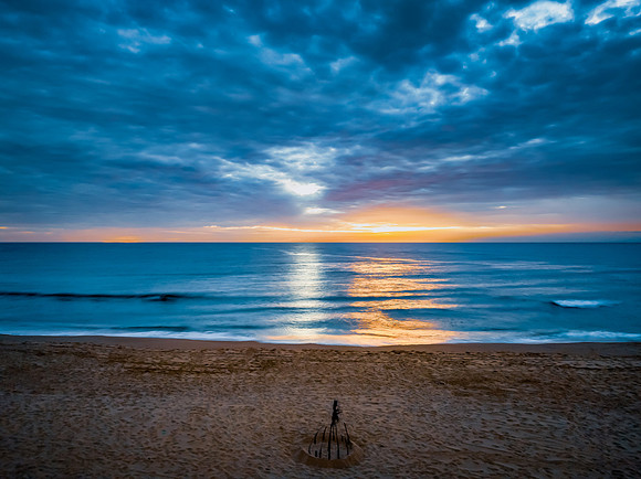 Sunrise at the Seaside with rain clouds